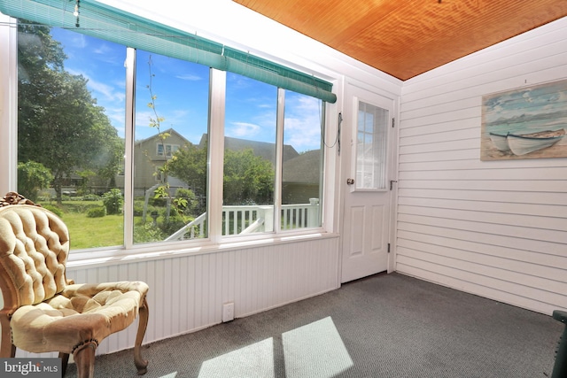604 Market St, Pocomoke City, MD 21851 - sunroom featuring wood walls, carpet flooring, and wooden ceiling