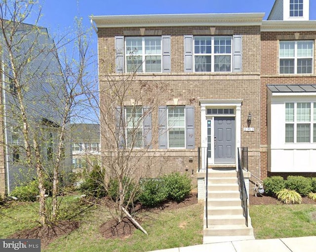 2111 Garden Grove Ln, Bowie, MD 20721 - townhome / multi-family property featuring brick siding