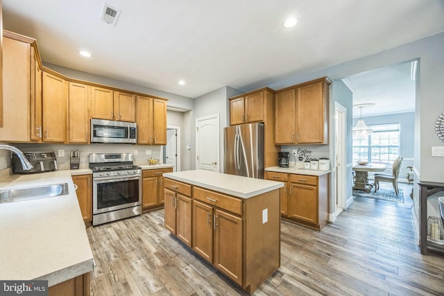 19 Hickory Ridge Ct, Mullica Hill, NJ 08062 - kitchen with stainless steel appliances, a sink, light wood finished floors, light countertops, and recessed lighting