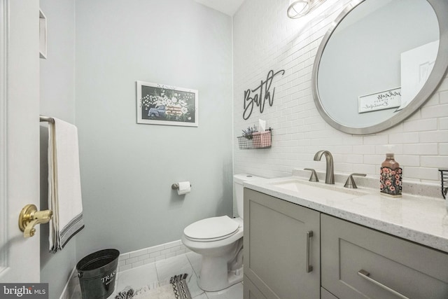 19 Hickory Ridge Ct, Mullica Hill, NJ 08062 - half bathroom with vanity, toilet, tile walls, baseboards, and backsplash