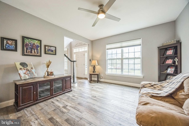 19 Hickory Ridge Ct, Mullica Hill, NJ 08062 - living area featuring light wood-type flooring, ceiling fan, and baseboards