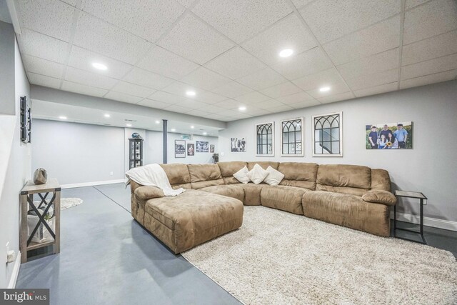 19 Hickory Ridge Ct, Mullica Hill, NJ 08062 - living area with baseboards, recessed lighting, concrete floors, and a paneled ceiling
