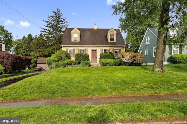 10 Pershing Ave, Ewing, NJ 08618 - cape cod-style house featuring a chimney and a front lawn