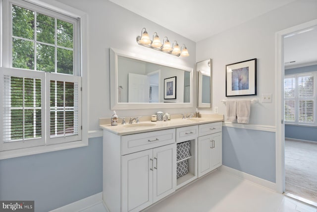 9300 Olivia Pl, Burke, VA 22015 - full bathroom with double vanity and baseboards