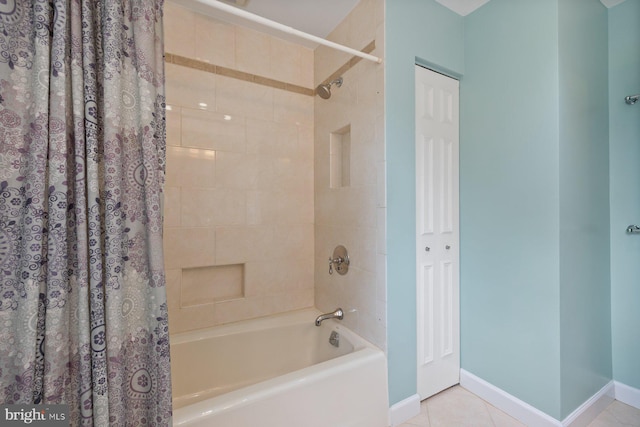 9300 Olivia Pl, Burke, VA 22015 - bathroom featuring shower / bath combo with shower curtain, baseboards, and tile patterned floors