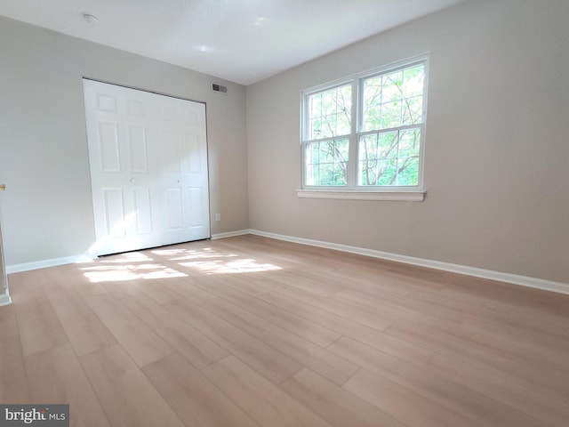 100 Park Blvd Unit 14A, Cherry Hill, NJ 08034 - unfurnished bedroom featuring light wood-style floors, baseboards, and a closet