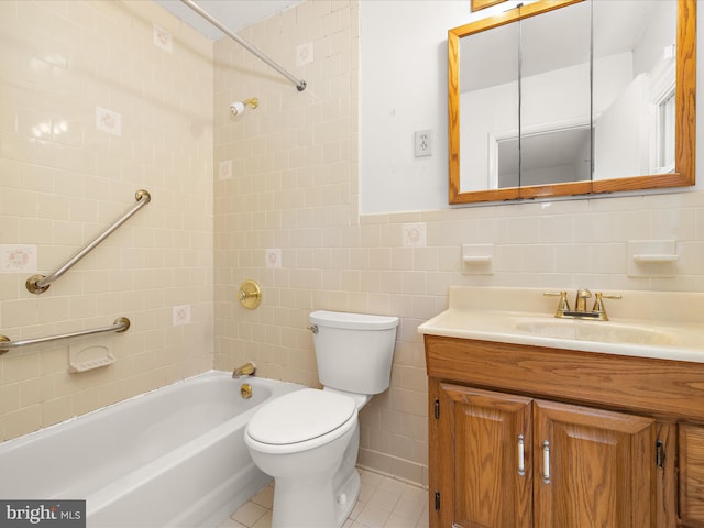 6748 Glenkirk Rd, Baltimore, MD 21239 - full bathroom with tile walls, vanity, bathtub / shower combination, toilet, and tile patterned floors