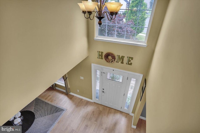 7 Kantner Ln N, Reading, PA 19607 - entrance foyer featuring wood finished floors, a towering ceiling, plenty of natural light, a chandelier, and baseboards