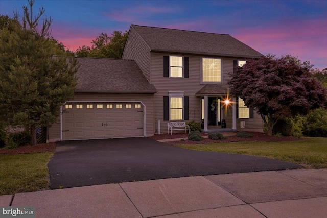 7 Kantner Ln N, Reading, PA 19607 - colonial inspired home featuring an attached garage, driveway, a front yard, and a shingled roof