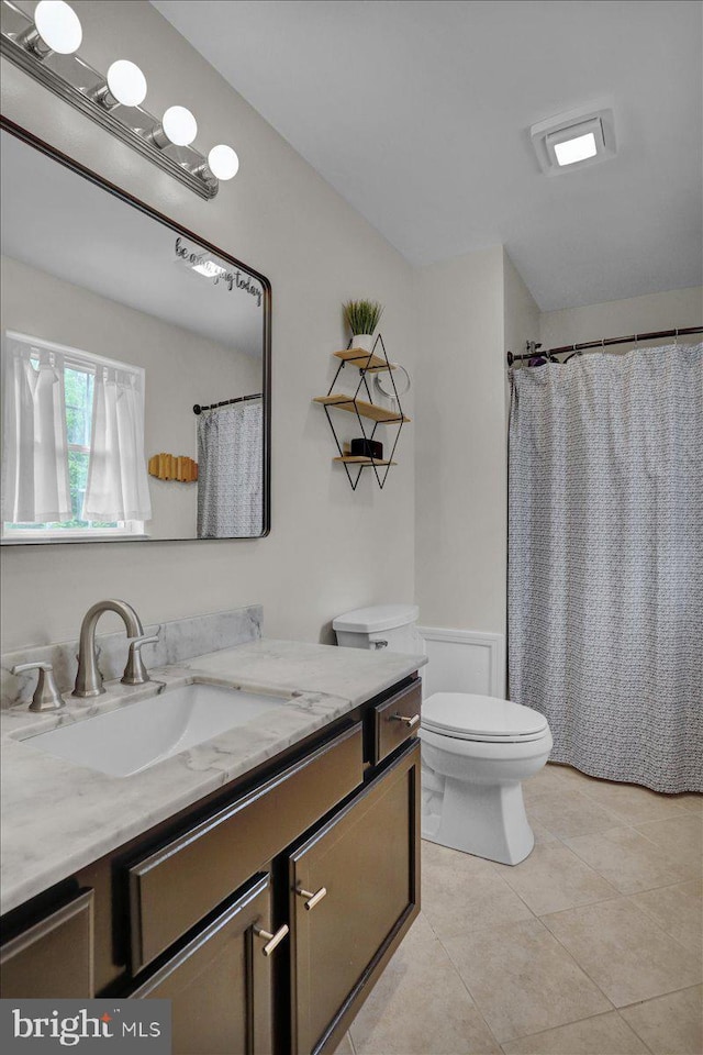 7 Kantner Ln N, Reading, PA 19607 - bathroom with toilet, vanity, and tile patterned floors
