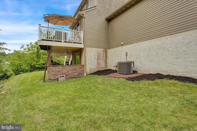 7 Kantner Ln N, Reading, PA 19607 - view of green lawn featuring central air condition unit and a deck