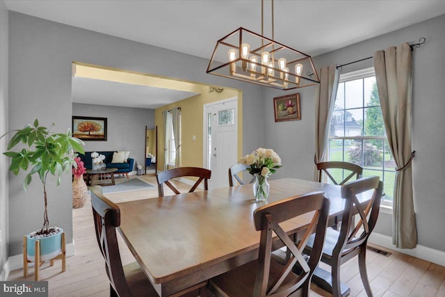7 Kantner Ln N, Reading, PA 19607 - dining space with light wood-style flooring, baseboards, and a chandelier