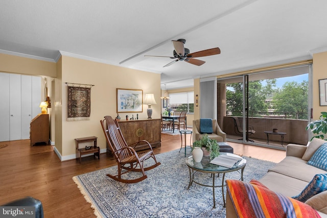4515 Willard Ave Unit 610S, Chevy Chase, MD 20815 - living area featuring ornamental molding, ceiling fan, wood finished floors, and baseboards