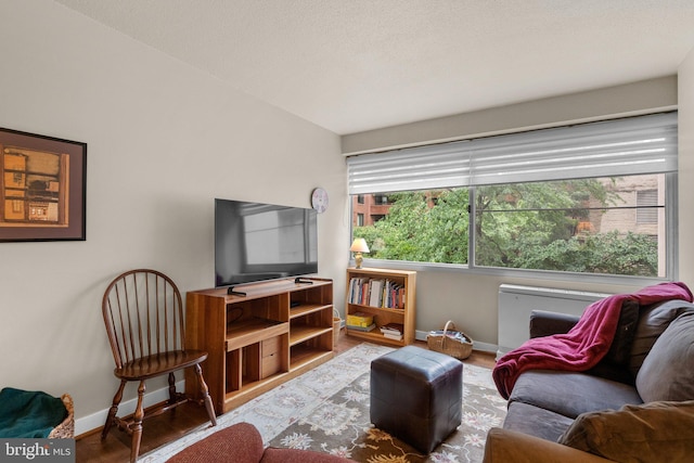 4515 Willard Ave Unit 610S, Chevy Chase, MD 20815 - living area featuring baseboards and wood finished floors
