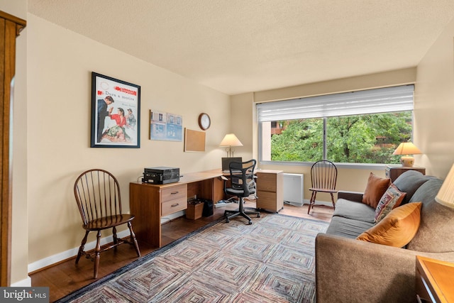4515 Willard Ave Unit 610S, Chevy Chase, MD 20815 - home office featuring baseboards, wood finished floors, and a textured ceiling