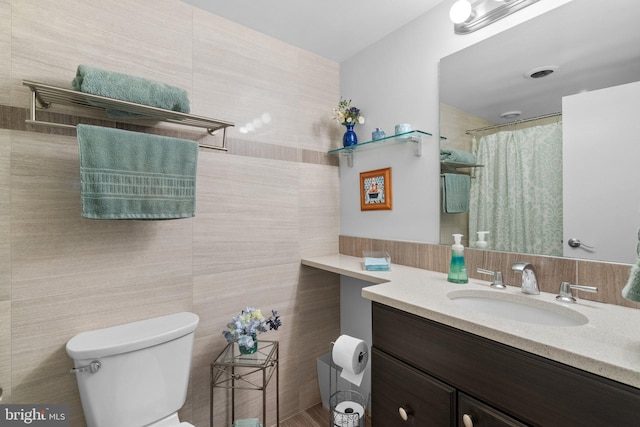 4515 Willard Ave Unit 610S, Chevy Chase, MD 20815 - full bathroom featuring toilet, vanity, tile walls, and a shower with shower curtain
