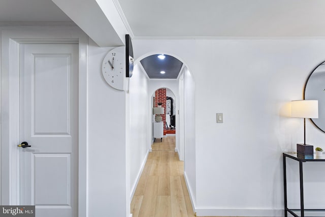 347 Clarks Tract Tract, Keswick, VA 22947 - hall with light wood-style flooring, arched walkways, and ornamental molding