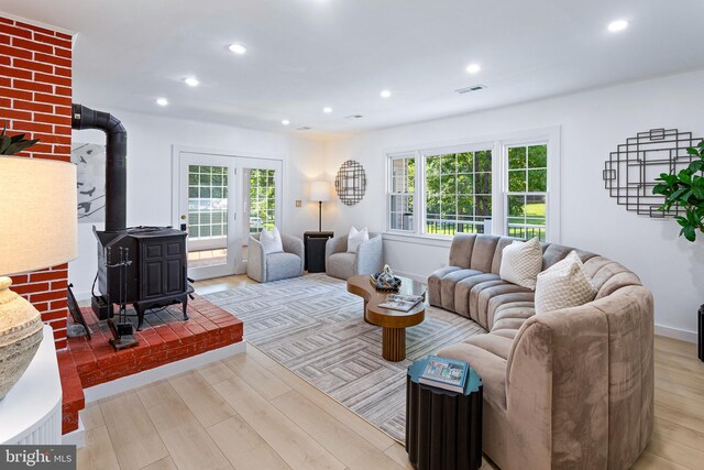 347 Clarks Tract Tract, Keswick, VA 22947 - living area featuring light wood finished floors, recessed lighting, and a wood stove