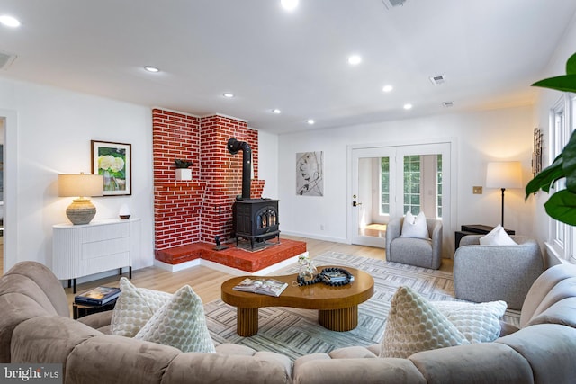 347 Clarks Tract Tract, Keswick, VA 22947 - living area with light wood-style flooring, a wood stove, and recessed lighting
