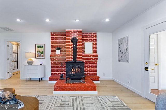 347 Clarks Tract Tract, Keswick, VA 22947 - living area with wood finished floors, recessed lighting, and a wood stove