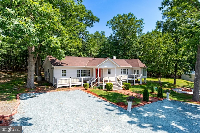 347 Clarks Tract Tract, Keswick, VA 22947 - single story home featuring a front lawn, a shingled roof, and a deck