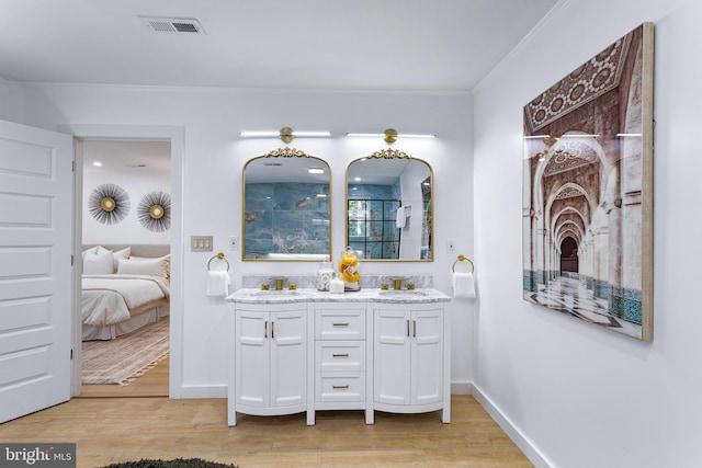 347 Clarks Tract Tract, Keswick, VA 22947 - bathroom with double vanity, wood finished floors, ornamental molding, ensuite bath, and a shower