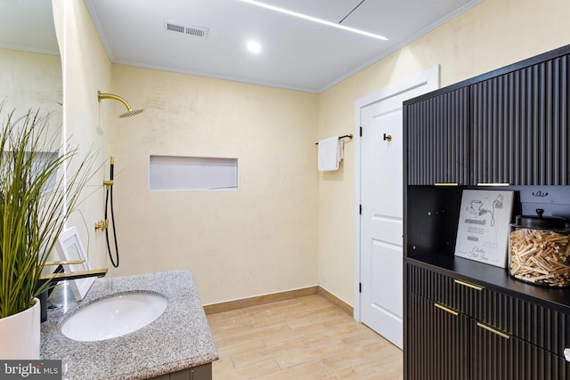 347 Clarks Tract Tract, Keswick, VA 22947 - bathroom with crown molding, wood finished floors, vanity, and a shower
