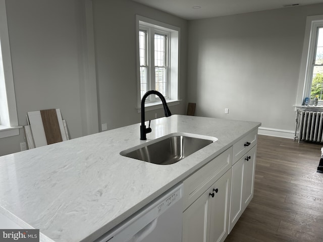 825 Jersey Ave, Gloucester City, NJ 08030 - kitchen featuring white dishwasher, radiator heating unit, a sink, white cabinets, and light stone countertops