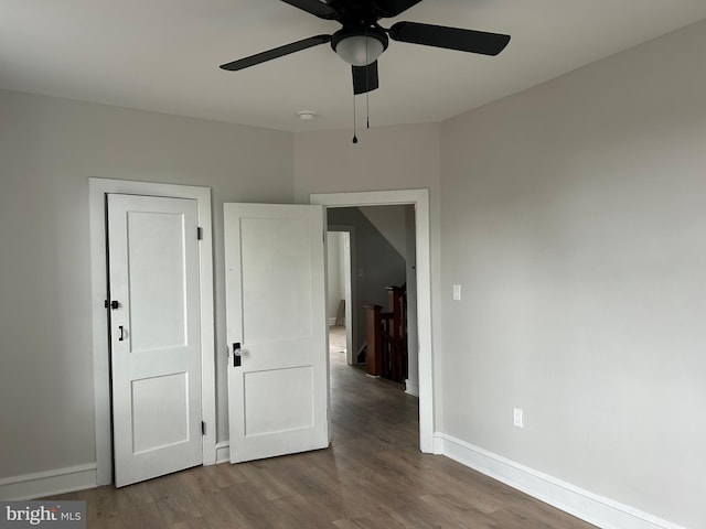 825 Jersey Ave, Gloucester City, NJ 08030 - empty room with ceiling fan, wood finished floors, baseboards, and a smoke detector