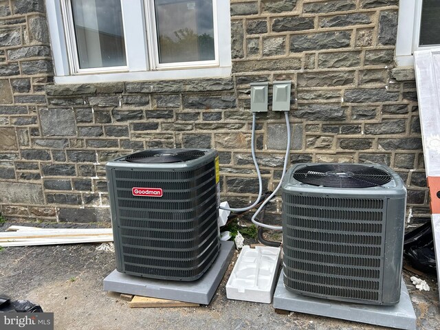825 Jersey Ave, Gloucester City, NJ 08030 - exterior view of central AC unit and stone siding