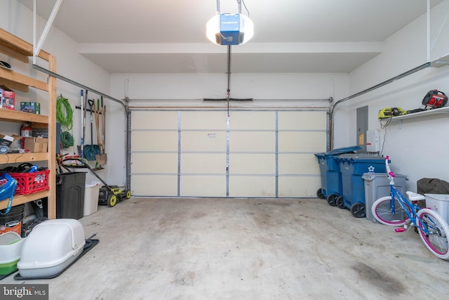 51 Phoebe Farms Ln, New Castle, DE 19720 - garage with a garage door opener and electric panel