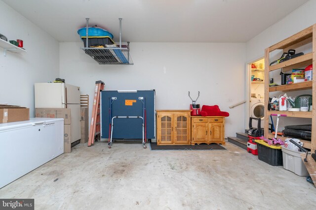 51 Phoebe Farms Ln, New Castle, DE 19720 - garage featuring freestanding refrigerator