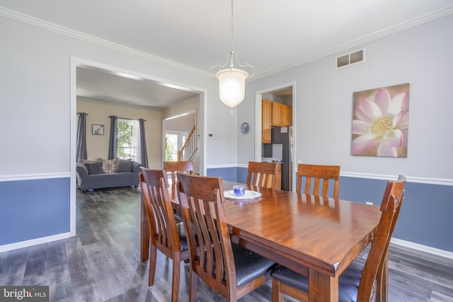 51 Phoebe Farms Ln, New Castle, DE 19720 - dining area with ornamental molding, stairway, wood finished floors, and baseboards
