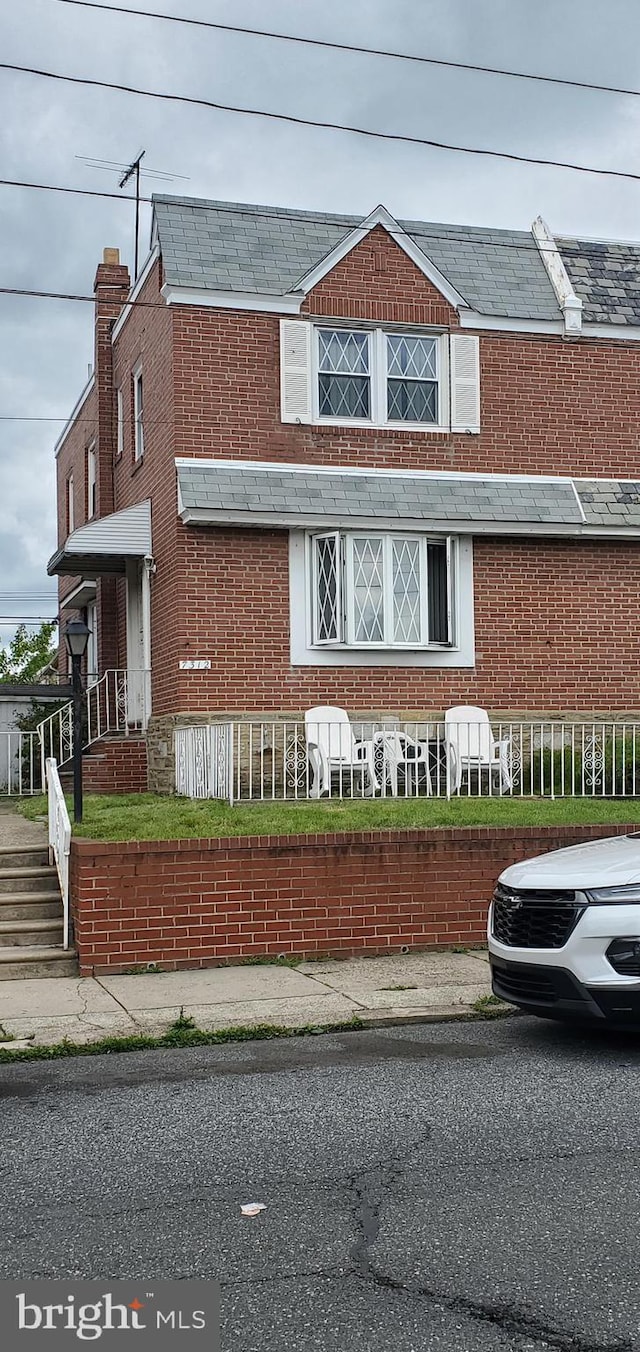 7312 Sackett St, Philadelphia, PA 19152 - view of front of house featuring brick siding