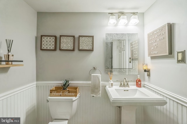 2 E Park Rd, Newtown, PA 18940 - half bath with toilet and a wainscoted wall