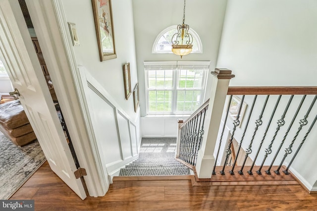 2 E Park Rd, Newtown, PA 18940 - stairway with plenty of natural light, wood finished floors, a chandelier, and a towering ceiling