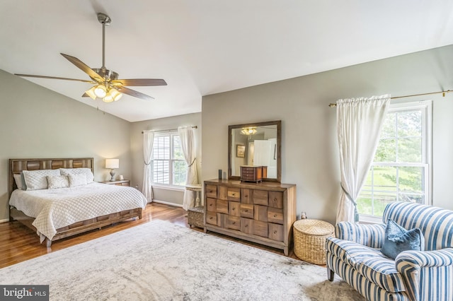 2 E Park Rd, Newtown, PA 18940 - bedroom with vaulted ceiling, wood finished floors, baseboards, and ceiling fan
