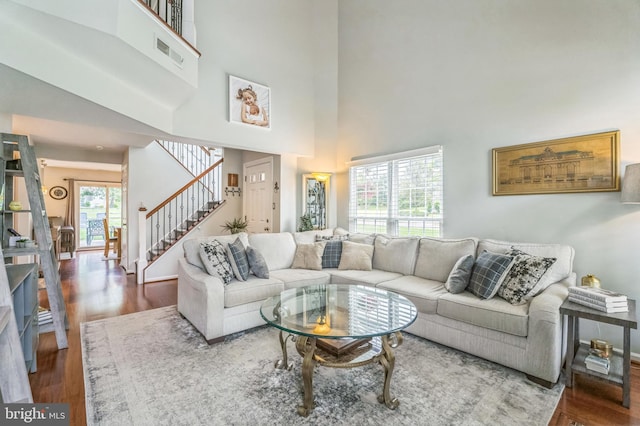 2 E Park Rd, Newtown, PA 18940 - living area featuring stairway, a high ceiling, and wood finished floors