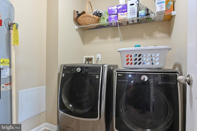 1 Bertram Dr, Glen Burnie, MD 21060 - laundry area with washing machine and dryer, water heater, and baseboards