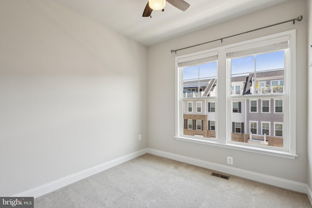 1909 Greenbriar Hall Rd, Dumfries, VA 22026 - carpeted spare room with baseboards and ceiling fan
