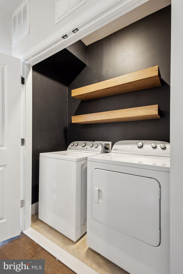 1909 Greenbriar Hall Rd, Dumfries, VA 22026 - laundry room featuring washer and clothes dryer