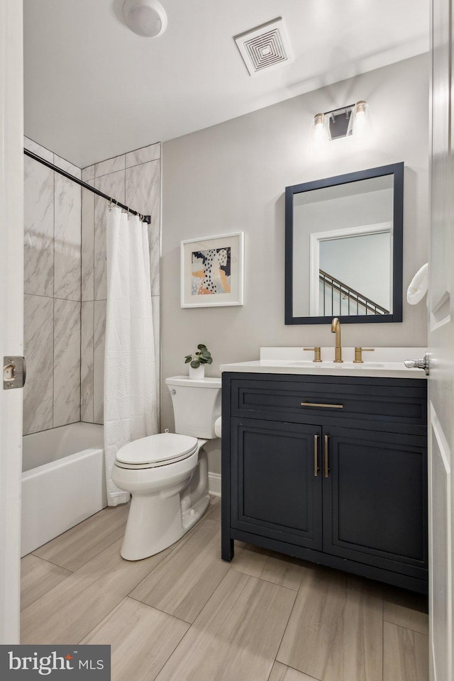 1909 Greenbriar Hall Rd, Dumfries, VA 22026 - full bathroom featuring toilet, vanity, and shower / bath combo