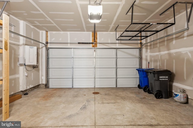 1909 Greenbriar Hall Rd, Dumfries, VA 22026 - garage with electric panel and a garage door opener