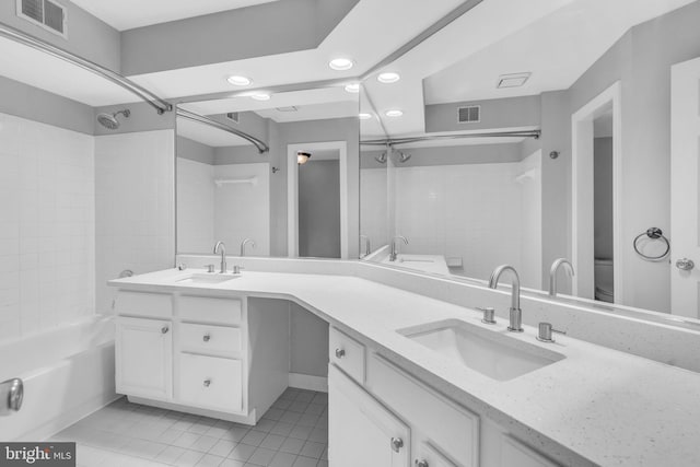1334 Garden Wall Cir Unit 407, Reston, VA 20194 - full bath featuring  shower combination, double vanity, tile patterned floors, and recessed lighting