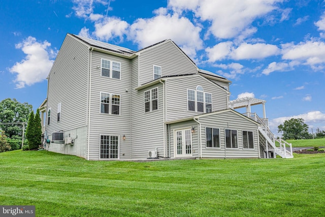 7425 Signal Hill Rd, Manassas, VA 20111 - back of house featuring french doors, a lawn, and a pergola