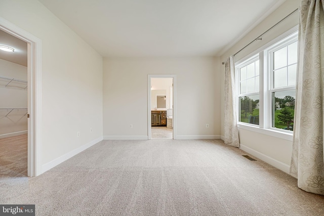 7425 Signal Hill Rd, Manassas, VA 20111 - unfurnished bedroom with light carpet and ensuite bathroom