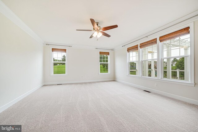 7425 Signal Hill Rd, Manassas, VA 20111 - empty room featuring crown molding, ceiling fan, and light colored carpet