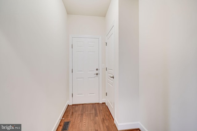 7425 Signal Hill Rd, Manassas, VA 20111 - hall with light wood-style floors and baseboards