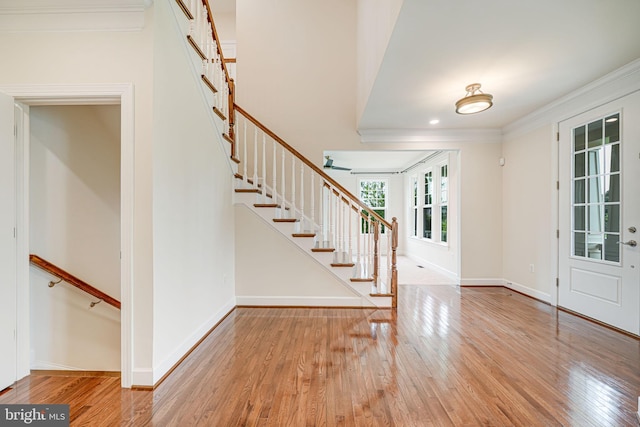 7425 Signal Hill Rd, Manassas, VA 20111 - foyer featuring hardwood / wood-style floors, stairway, and crown molding