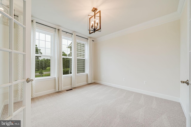 7425 Signal Hill Rd, Manassas, VA 20111 - spare room with a chandelier, ornamental molding, light carpet, and french doors